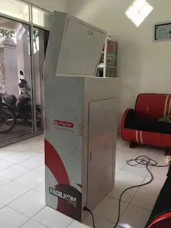 bagian belakang mesin scan tiket