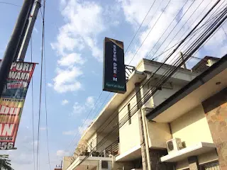 Tampak Depan Belakang Neon Box Seven Dream Jember